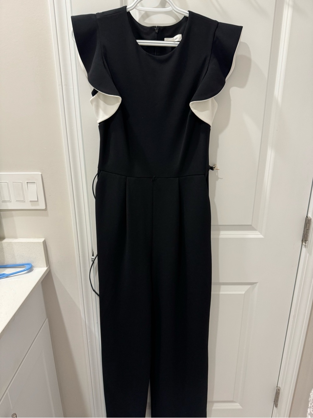 Calvin Klein Black Jumpsuit with White Ruffle Sleeves